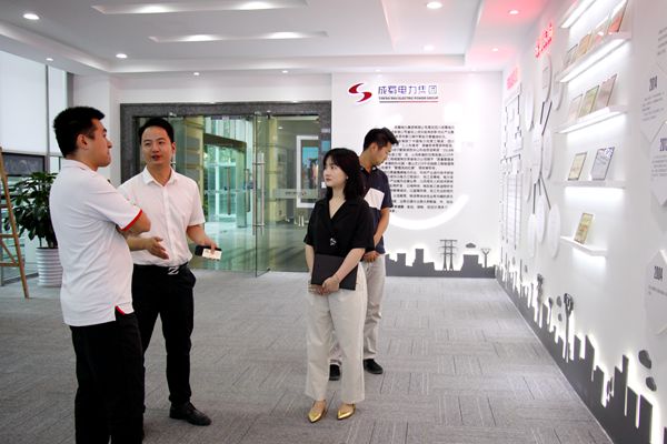 郵政儲蓄銀行高新支行領(lǐng)導一行來我司考察交流